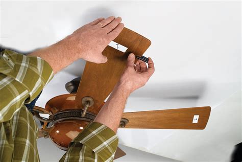 out of balance fan due to metal blade brackets|how to balance ceiling fan blades.